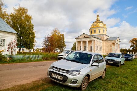 Velikoretskoe, Russia - September 15, 2019: Traditional russian church with domes and cars near it in a summer or autumn day. Famous Church in the village of Velikoretsky before religious Processionのeditorial素材
