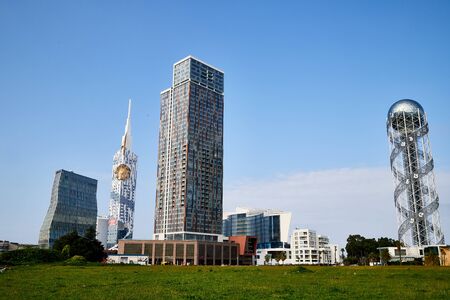 Batumi, Georgia - October 23, 2019: Part of city Batumi with houses, plant and blue sky with white clouds on a summer or autumn day in the country of Georgia, Adjaraのeditorial素材
