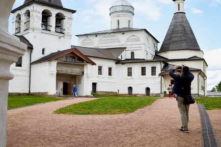 Ferapontovo, Russia - June 26, 2019: White stone Church, yard and people in Ferapontov monastery in a summer day in Ferapontovo in Russiaのeditorial素材