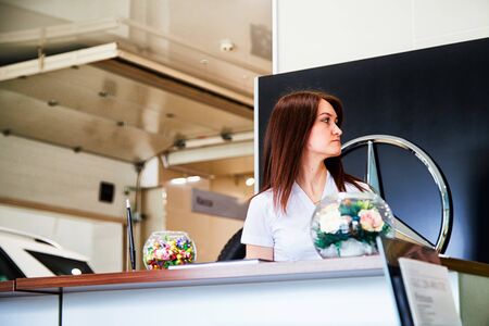 Kirov, Russia - May 07, 2019: Manager in showroom of dealership Mercedes in Kirov in 2019