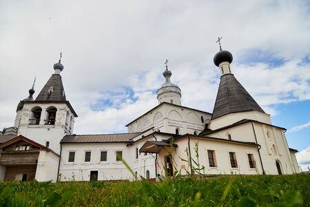 Wall and dome of Ferapontov monastery in a summer day in Ferapontovo in Russia
