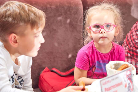 Kirov, Russia - October, 2019: People at table in small cafe or restaurant during intellectual game. People waiting for the waiter to get the menu or foodのeditorial素材