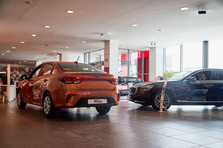 Murmansk, Russia - June 21, 2019: Cars in showroom of dealership KIA in Murmansk city in Russia