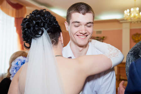 Russia, Kirov - March 22, 2019: Wedding and marriage registration at the registry office. Bride and groom with guestsのeditorial素材
