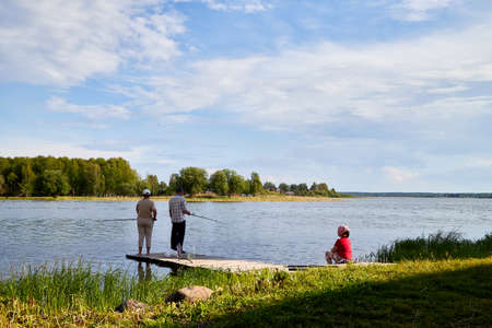 Kirillov, Russia - June 18, 2019: Fisherman people on the lake shore on a summer day near the Kirillo-Belozersky monasteryのeditorial素材