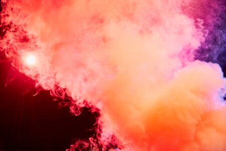Color smoke on black background. Colorful red and blue background for photo shoot. Colored smoke...