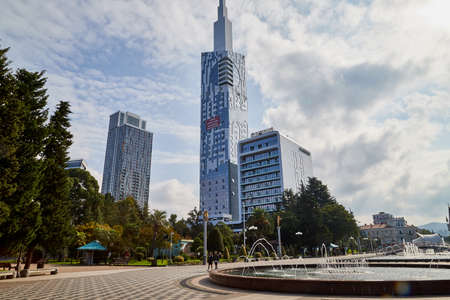 Batumi, Georgia - October 23, 2019: Part of city Batumi with houses, plant and blue sky with white clouds on a summer or autumn day in the country of Georgia, Adjaraのeditorial素材