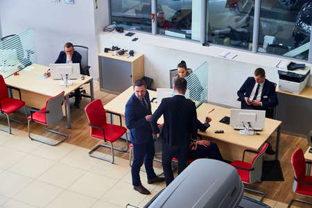 Murmansk, Russia - June 21, 2019: Managers in showroom with cars of dealership Toyota in Murmansk city in Russiaのeditorial素材
