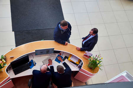 Murmansk, Russia - June 21, 2019: Managers in showroom with cars of dealership Toyota in Murmansk city in Russiaのeditorial素材