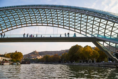 Tbilisi, Georgia - October 21, 2019: River Kura in capital of Georgia Tbilisi in a daytime and sightseeing from the water in a summer, or autumn dayのeditorial素材