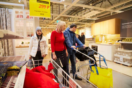 Kazan, Russia - December 22, 2019: Interior in hall of large IKEA store with a wide range of products and people in it in Russiaのeditorial素材