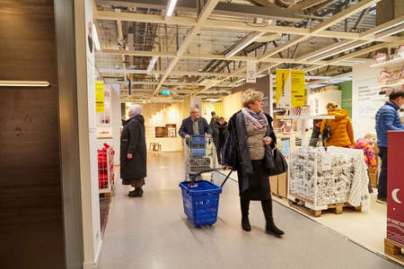 Kazan, Russia - December 22, 2019: Interior in hall of large IKEA store with a wide range of products and people in it in Russiaのeditorial素材