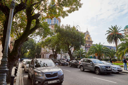 Batumi, Georgia - October 23, 2019: Part of city Batumi with houses, plant and blue sky with white clouds on a summer or autumn day in the country of Georgia, Adjaraのeditorial素材