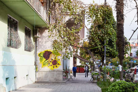 Batumi, Georgia - October 23, 2019: Part of city Batumi with houses, plant and blue sky with white clouds on a summer or autumn day in the country of Georgia, Adjaraのeditorial素材