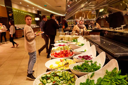 Antalia, Turkey - December 12, 2019: Food on the shelves in the self-service buffet with all...
