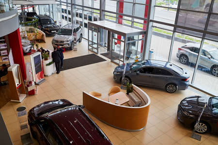 Murmansk, Russia - June 21, 2019: Cars in showroom of dealership Toyota in Murmansk city in Russia....
