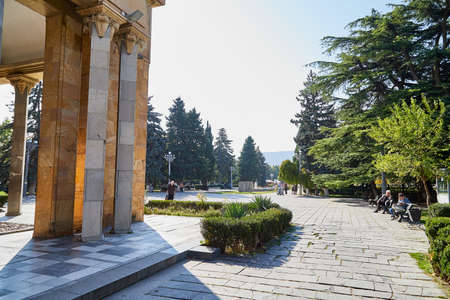 Gori, Georgia - October 22, 2019: The museum of the soviet union's dictator and ruler Stalin and the little house where he was born among the big columnsのeditorial素材