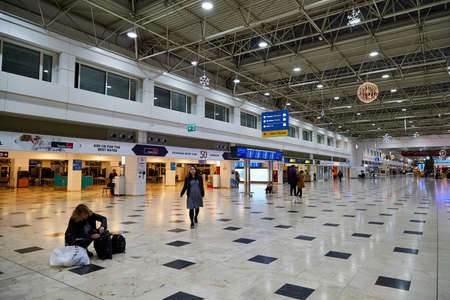 Antalya, Turkey - December 21, 2019: Large hall at the airport and passengers are waiting in line for check in and boardingのeditorial素材