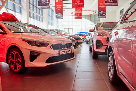 Murmansk, Russia - June 21, 2019: Cars in showroom of dealership KIA in Murmansk city in Russia