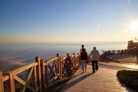 Antalya, Turkey - December 18, 2019: Embankment with people in the evening in Antalya in Turkeyのeditorial素材