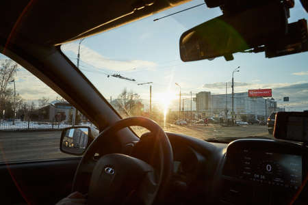 Kazan, Russia - December 22, 2019: View from the car on the street in the city in Russiaのeditorial素材