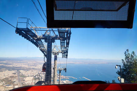 Cable Car in the mountain and blue sea background in sunny day in Turkeyの写真素材