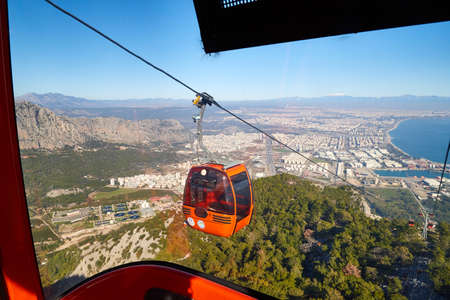 Cable Car in the mountain and blue sea background in sunny day in Turkeyの写真素材