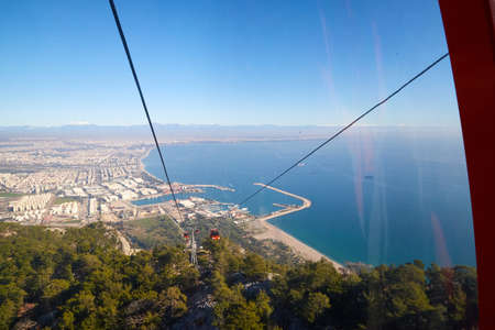 Cable Car in the mountain and blue sea background in sunny day in Turkeyの写真素材