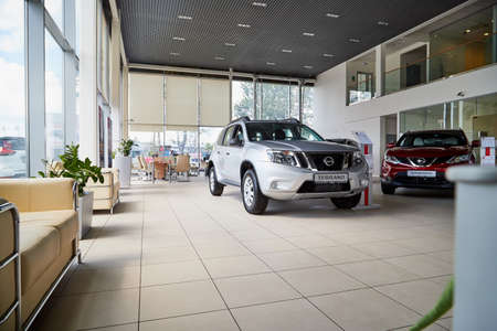 Vologda, Russia - June 18, 2019: Cars in showroom of dealership Nissan in Vologda city in Russiaのeditorial素材