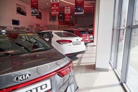 Murmansk, Russia - June 21, 2019: Cars in showroom of dealership KIA in Murmansk city in Russia