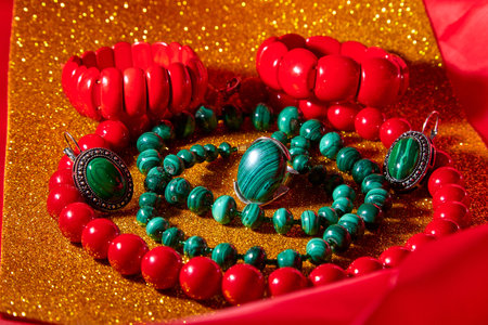 Jewelry from green malachite. Malachite beads and earrings in the studioの写真素材