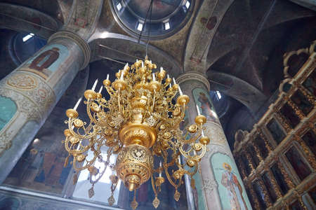 Slobodskoy, Russia - August 31, 2020: Interior of a traditional Christian Orthodox Russian church. The temple is inside with icons and an iconostasisのeditorial素材