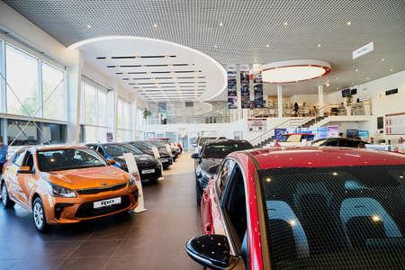 Vologda, Russia - June 18, 2019: Cars in showroom of dealership KIA in Vologda city in Russia