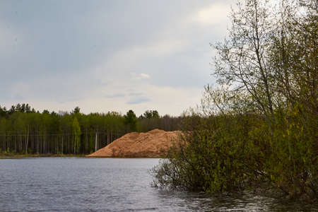 Water of a river or lake during flood on an early spring day
