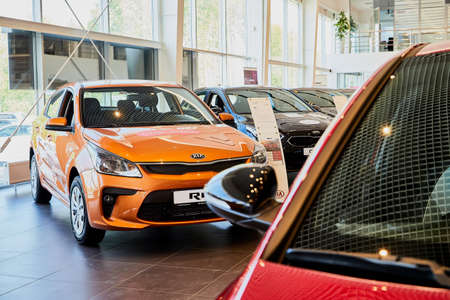 Vologda, Russia - June 18, 2019: Cars in showroom of dealership KIA in Vologda city in Russia