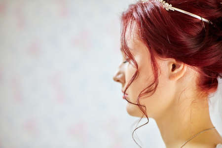 Bride in the room. Bbeautiful young girl preparing for the wedding