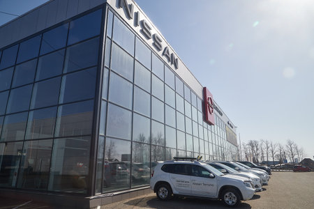Kirov, Russia - April 12, 2022: Entrance in showroom with cars of dealership Nissan in city Kirovのeditorial素材