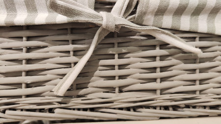 Texture of basket surface. pattern background. Wooden Vine Wicker straw Basket. handcraft weave texture natural wicker, texture basket, Natural rattan. Detail of curved basket weave surfaceの写真素材