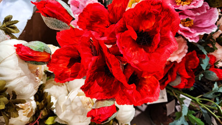 Delicate blossoming white flowers, blooming rose and red poppies festive background, flower bouquet image. Soft petals floral romance card. Abstract textureの写真素材