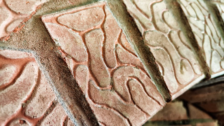 Red brick with texture and pattern on wall or floor. Abstract background, texture, frame, and...