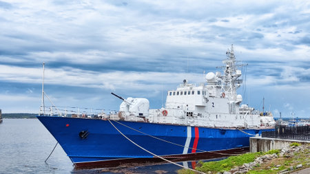 Russian military ship near peaceful shore. Military threat from Russians. Defense of Russia.の写真素材