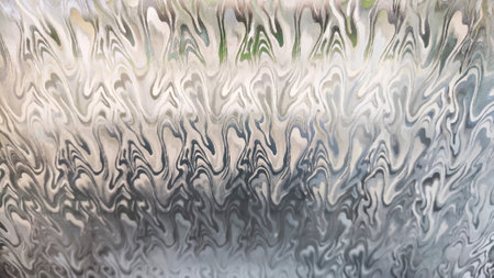 Decorative corrugated translucent glass with green color. Abstract background, texture, pattern. Copy space and frameの写真素材