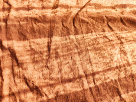 Abstract background and texture of crumpled brown fabric. Texture, pattern, frame and copy spaceの写真素材
