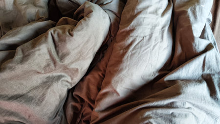 Abstract background and texture of crumpled brown fabric. Texture, pattern, frame and copy spaceの写真素材