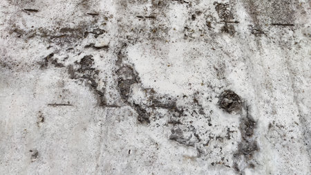 Abstract concrete gray background with dark uneven spots and rough texture. Frame and pattern, Copy space.の写真素材