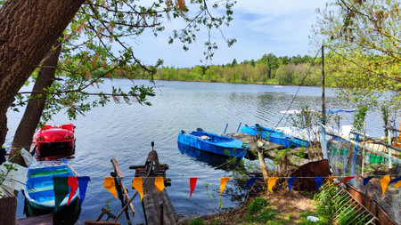 old boats on the river, autumn season. Web banner for your design. landscape with water and boatの写真素材