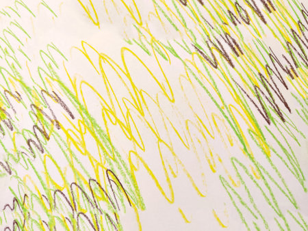 Drawing with strokes made with colorful children's crayons with the color yellow. Abstract...