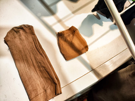 Socks sorted into pairs lie in a pile. Top view. Careful storage of clothes. Clutter and declutterの写真素材