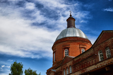 Beautiful old Orthodox church painted with domes and towers against the sky. Beautiful historical...