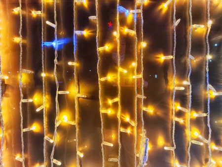 Close up LED lighting. Glowing yellow Christmas Lights. Abstract Background, texture, pattern,...